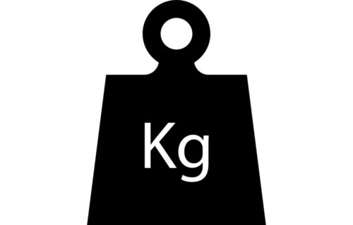 Una pesa con el simbolo de kilogramo en el centro.